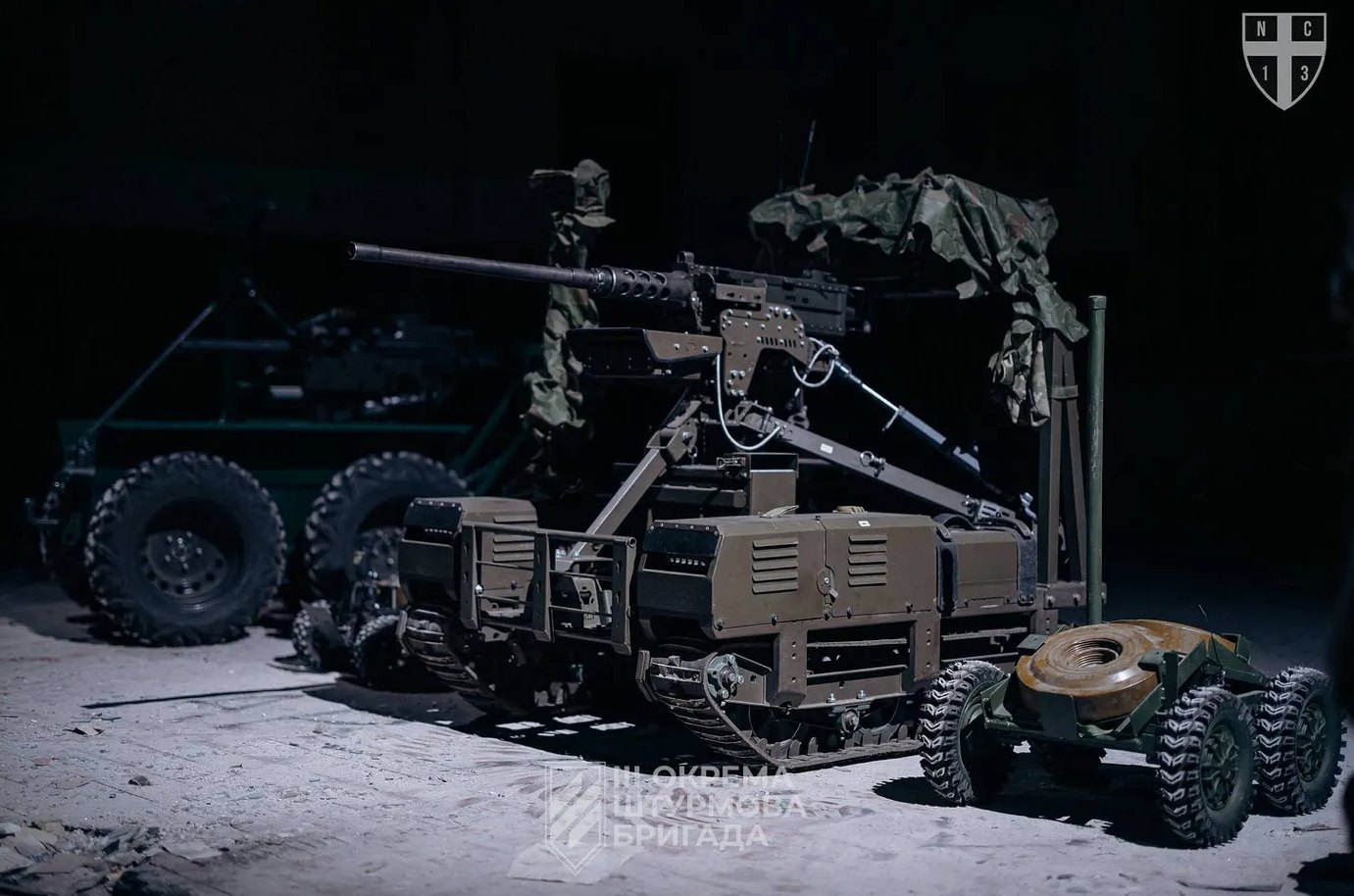 Unmanned ground vehicles (UGVs) equipped with heavy machine guns and robotic systems operated by the Strike UGV Company (NC13) of the 3rd Assault Brigade in Ukraine. Picture credit: Olena Kryzhanivska.